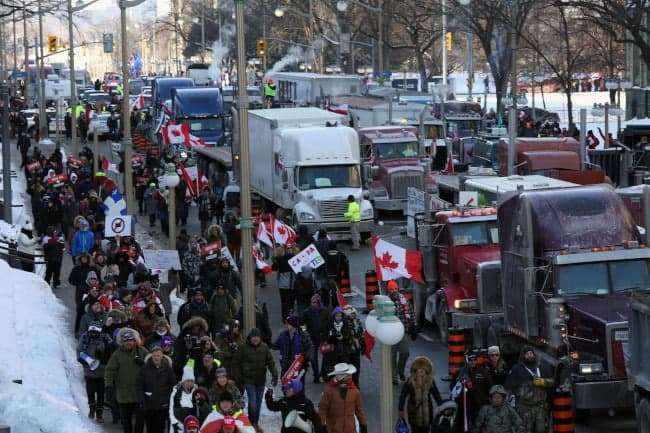 An der Sei­te der kana­di­schen Tru­cker gegen die Regie­run­gen des Kapitals!